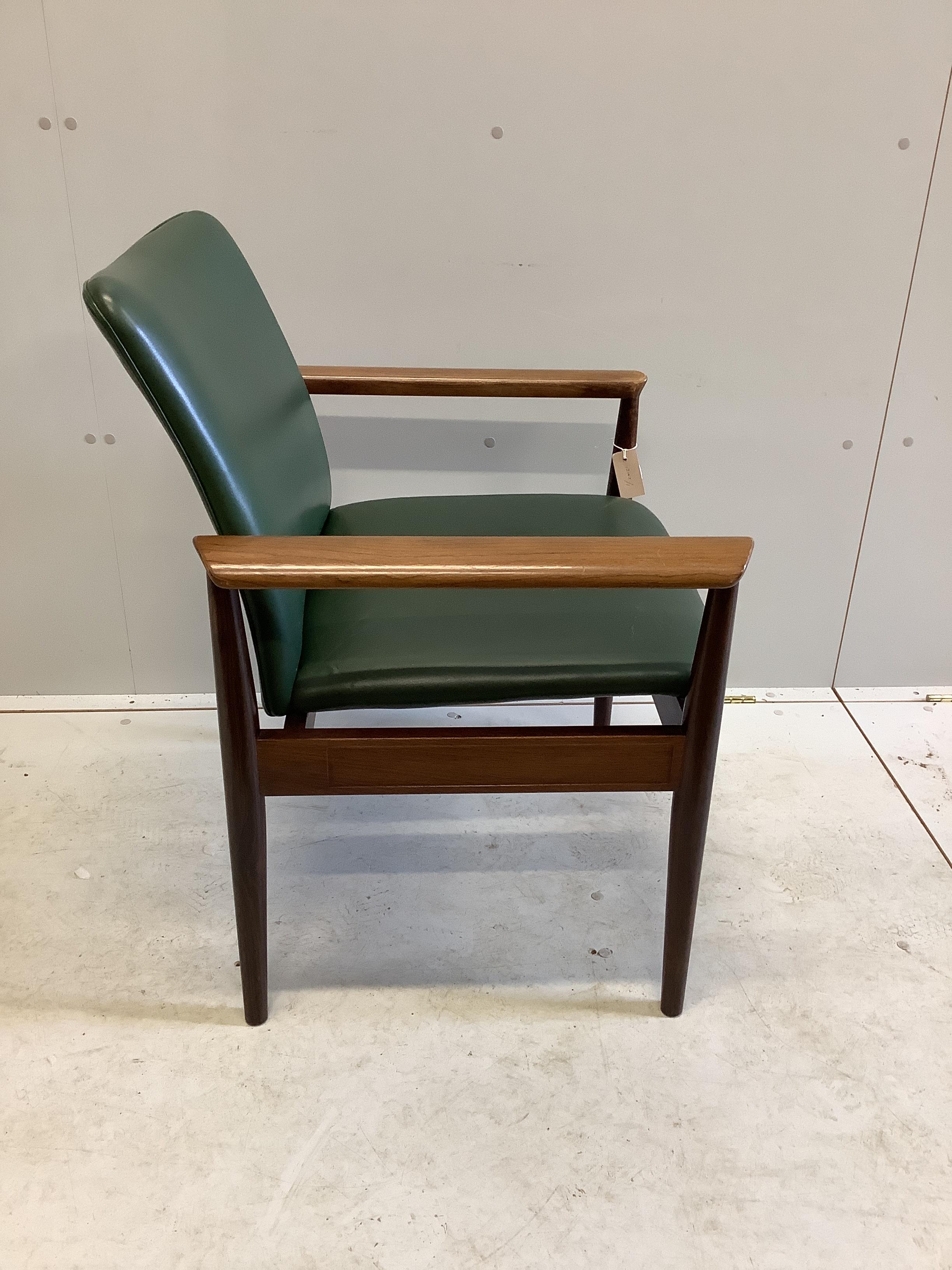 A mid century Danish Finnjuhl rosewood elbow chair, width 68cm, depth 50cm, height 80cm